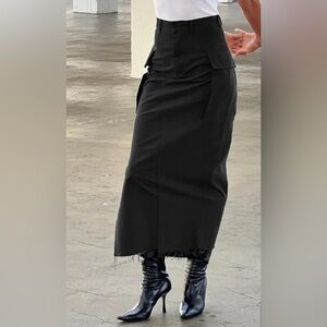 Black cargo maxi skirt with side slit and asymmetrical frayed hem